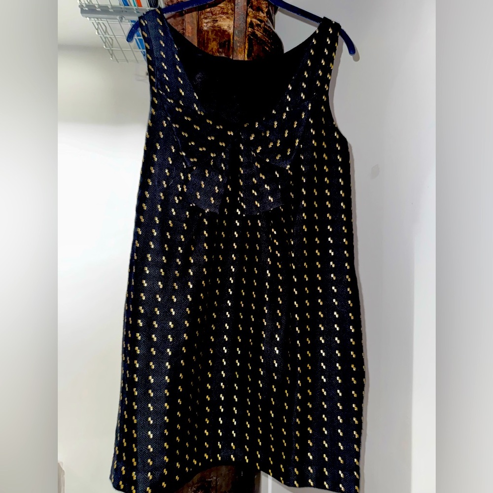 Classic with a twist only 1 made for NYC boutique.boxy fit if you wear a small